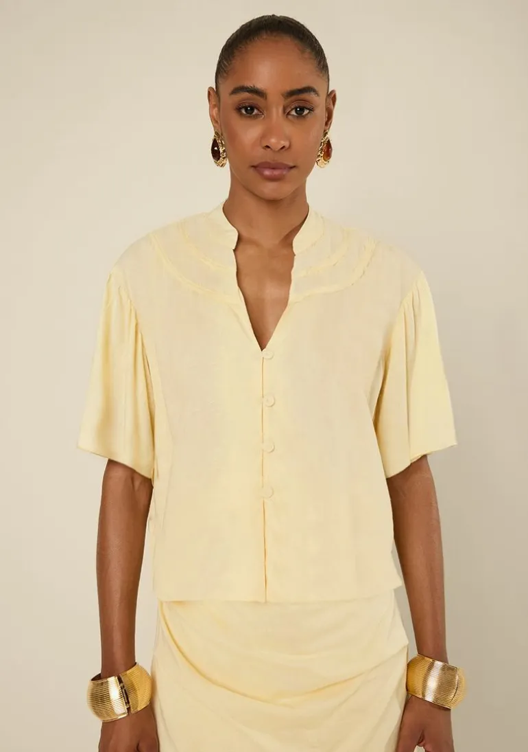 Blusa Morena Rosa Solta Decote V Manga Curta Padrão Amarelo