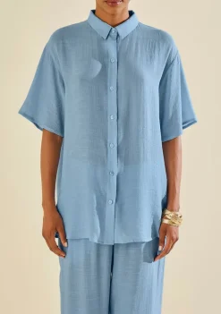 Camisa Morena Rosa Solta Gola Clássica Manga Curta Alongada Azul